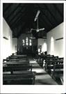 Interior view of St Mark's in Brookton, pews in the foreground
