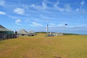 Distance view of the lighthouse and surrounds