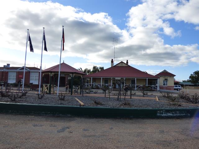 Memorial House with Flagpoles