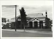 Angled front elevation of building