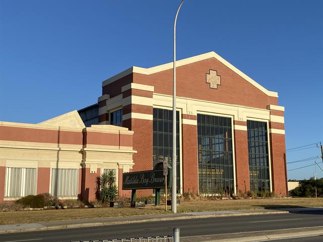 View from Stirling Hwy - large volume warehouse facade with brewing kettles