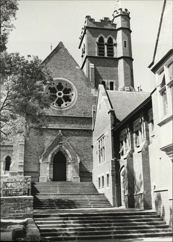 View of steps and doorway situated to the left of Burt Memorial Hall