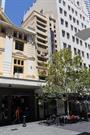 Devon House as viewed from Hay Street Mall (partly obscured by tree)