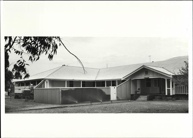 Angled front elevation of nurses quarters