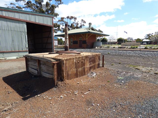 Crane Foundation with Goods Shed and Station Building in the back