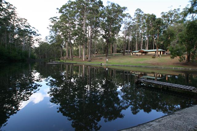 Dam wall, kiosk and reflections