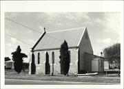 Front elevation from South west showing added weatherboard panneling on rear wal