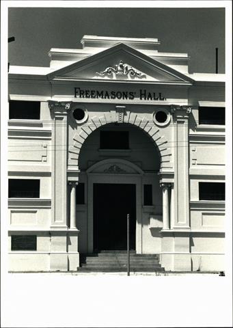 View of main entrance showing decorative columns & pediment