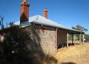 Side elevation showing vuggy limestone construction