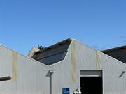 Glazing on south side of saw tooth roof