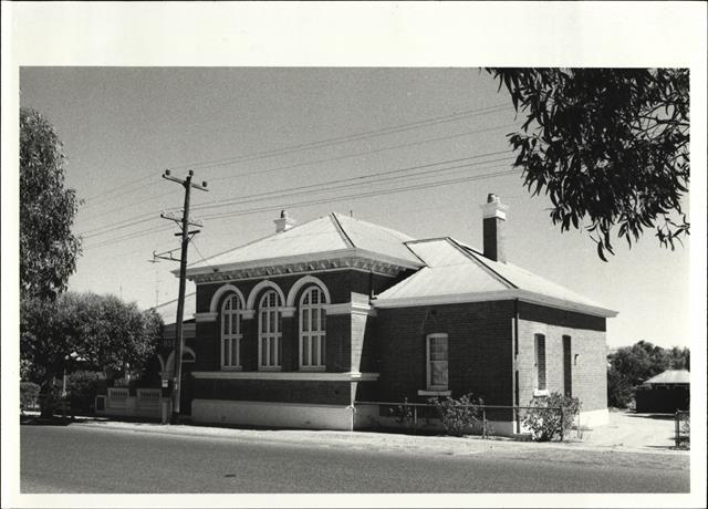 Angled front elevation of building