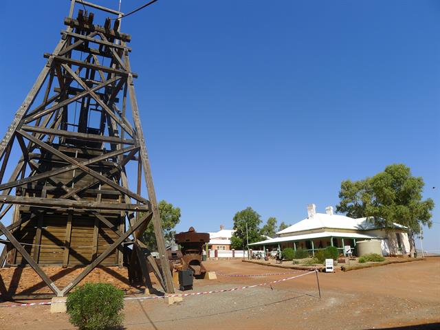 Headframe in foreground looking west