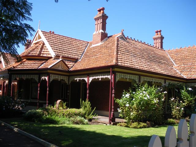 View looking south of Number 34 verandah in garden setting