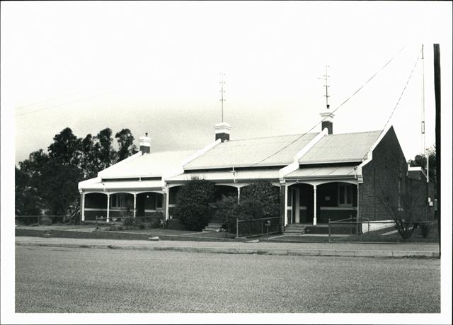 Angled front elevation of police station & quarters