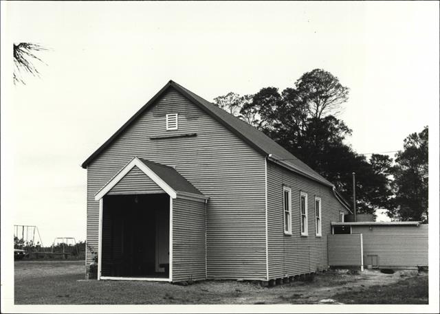 Angled front elevation of building