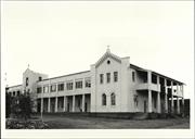Angled front elevation of first section of main building