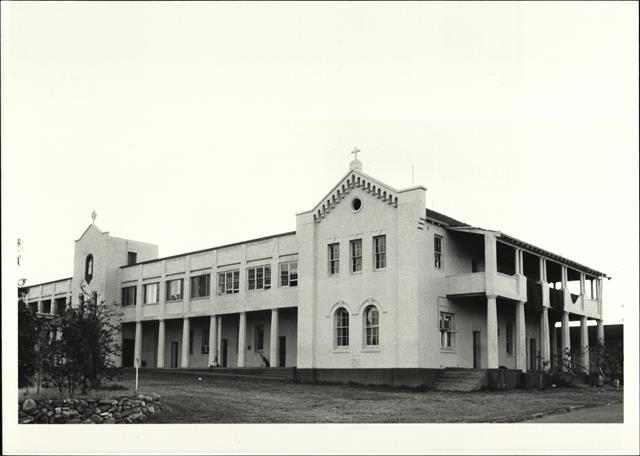 Angled front elevation of first section of main building