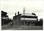 Angled front elevation of building