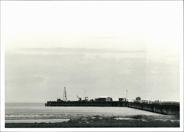 View of infrasturcture at end of jetty from shore