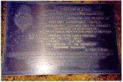 The wording on the Community Arts Sculpture 1989