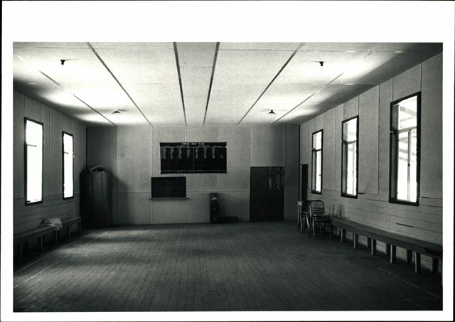 Interior view, facing the Kweda Golf Club Honour Roll, with benches down the sid