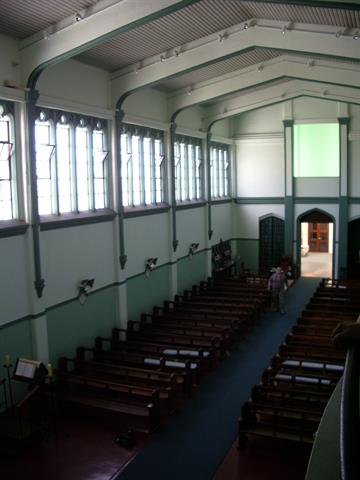 Interior nave looking west to entry from altar