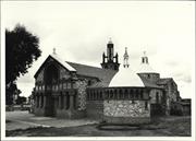 South west elevation of church with baptistry in foreground