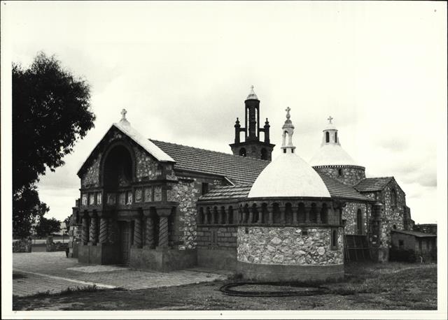 South west elevation of church with baptistry in foreground