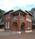 Front facade showing corner entrance and detailing