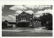 Angled front elevation of church from Angelo Street