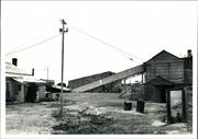 View across the site, office on the left, conveyor in the background