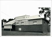Angled front elevation of building