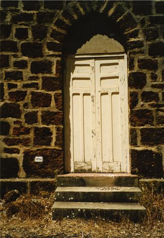 Entry door and date plaque