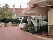View of houses (to right of image) through gate