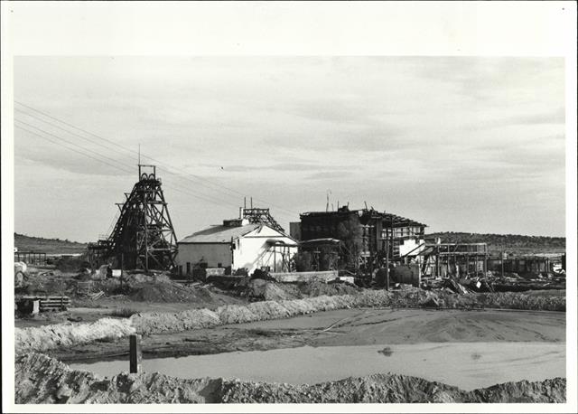 Distance view of mine with tailings dam in the foreground