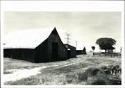 Left corner elevation of barn showing other buildings in background