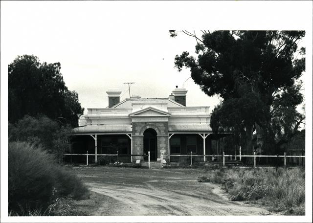 Front elevation from the drive showing setting