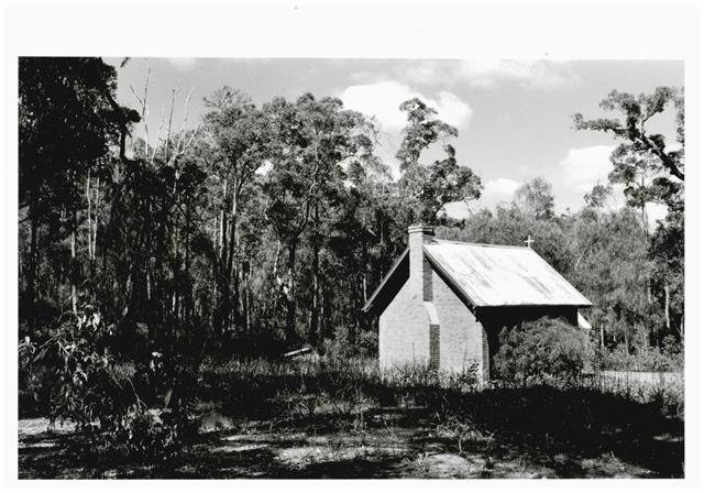 Rear and left side - oblique view of building in bush setting