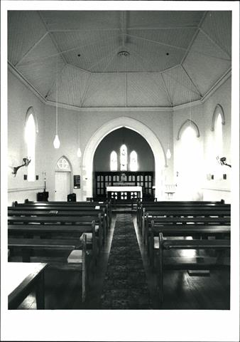 Interior portrait view with ceiling visible