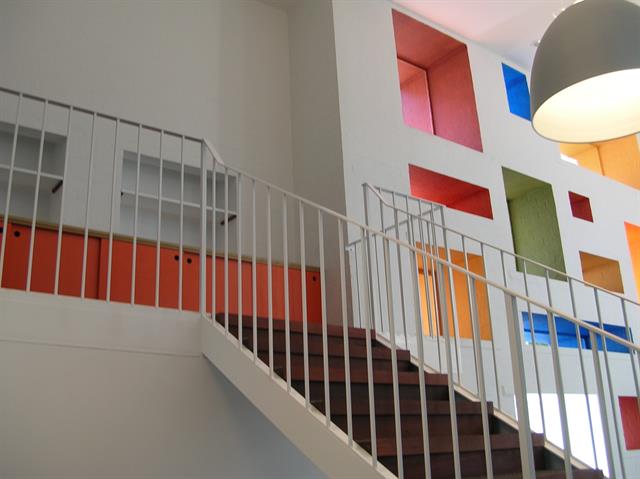 Interior view up stairs towards windows