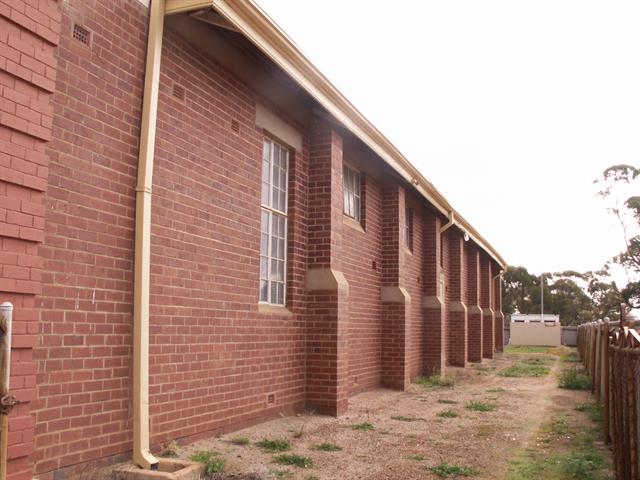 Side wall of Hall showing buttressing
