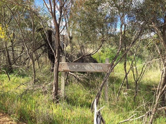 Hunts Dam signpost on entry from road
