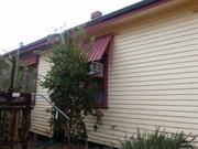 North facade - damage to window awning