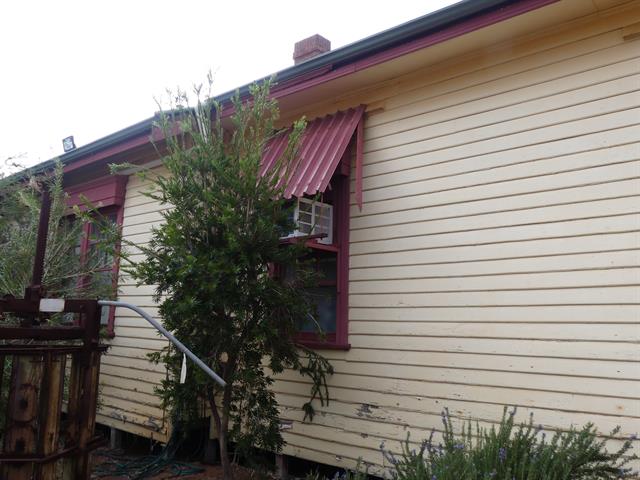 North facade - damage to window awning