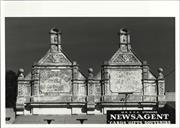 Detail of pediments of two shops