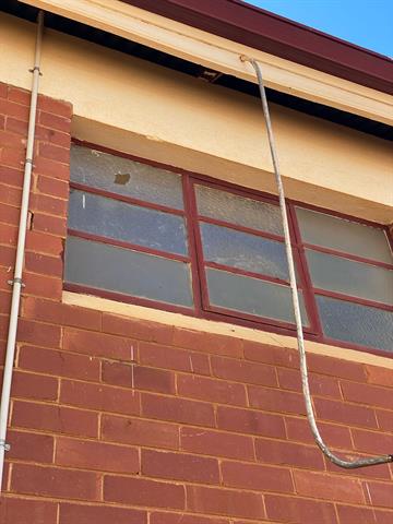 Broken window1 exterior view, photo courtesy Aimee Monaghan