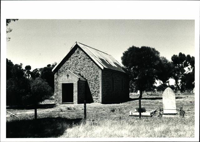 Front elevation of St John in the Wilderness showing graves in foreground