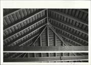 Interior view of garage showing detail of roof timber rafters, purlines and beam