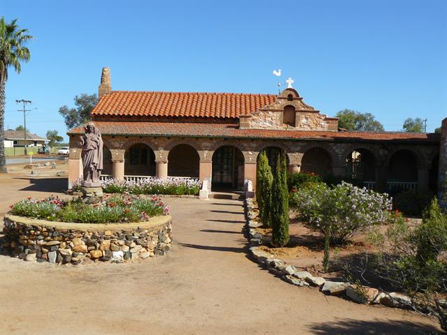 Priesthouse - north elevation across courtyard garden