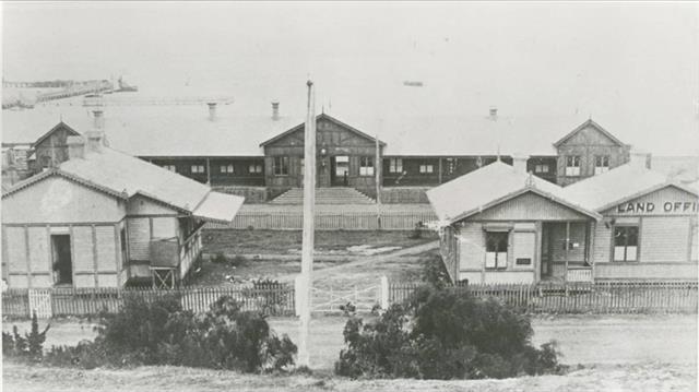 Early photo of the Railway Station in background
